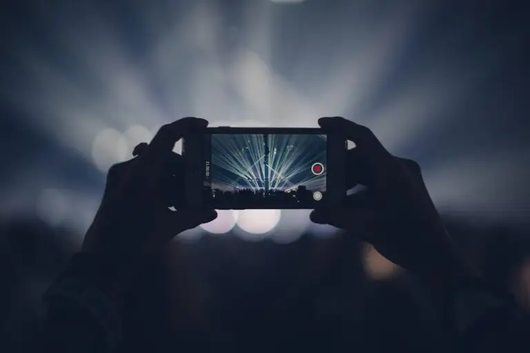 iphone, concert, lights, stage lights, record, video, recording, video recording, capture, apple product, hands, audience, event, live event, live performance, dark, party, smartphone, crowd, video, video, video, video, video